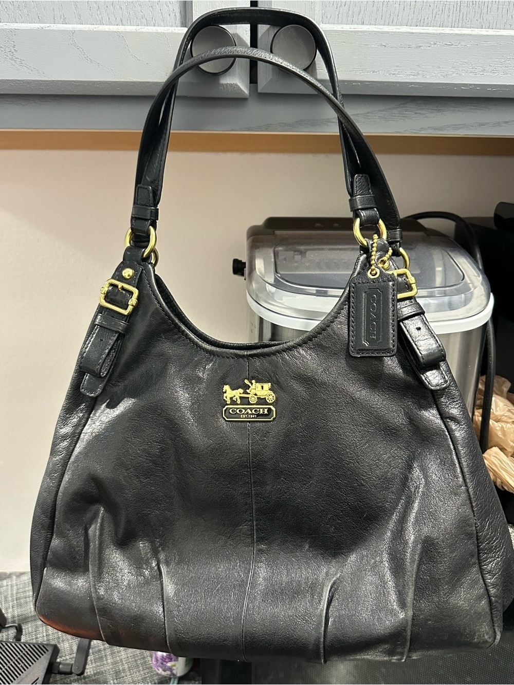 Coach Madison Maggie Black Leather Shoulder Bag w/ Gold Accents & purple liner.
